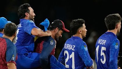 ...Cup 2024 in Photos: Gulbadin Naib's Four-For Overshadows Pat Cummins' Hat Trick As Australia Claim Super Eight Win...