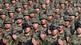 Serbia seeks return of its troops to Kosovo as tensions soar