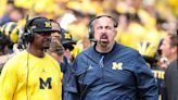 Michigan fires assistant Chris Partridge one day after Jim Harbaugh accepts suspension