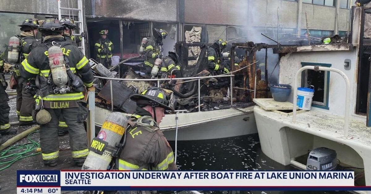 Heavy plume of smoke visible in Seattle after houseboats catch fire on Lake Union