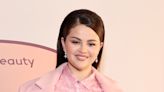 Selena Gomez looks 'smoking hot' as she dances in low-cut black dress to Rihanna