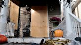 Police questioning a person of interest in Halloween decoration arsons