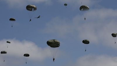 Mass parachute jump over Normandy kicks off commemorations for the 80th anniversary of D-Day