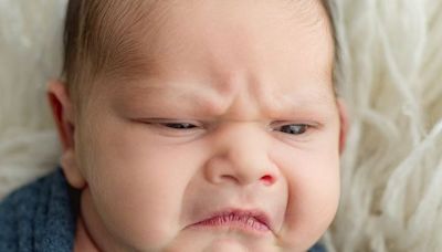 Photoshoot of grumpy baby goes viral, has the internet cooing: 'He's like seriously?'