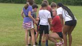 Kids learn flag football at New Albany mini camp