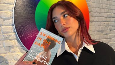 Dua Lipa's SERVICE95 Book Club Reveals 'Swimming In The Dark' by Tomasz Jedrowski as May's Read