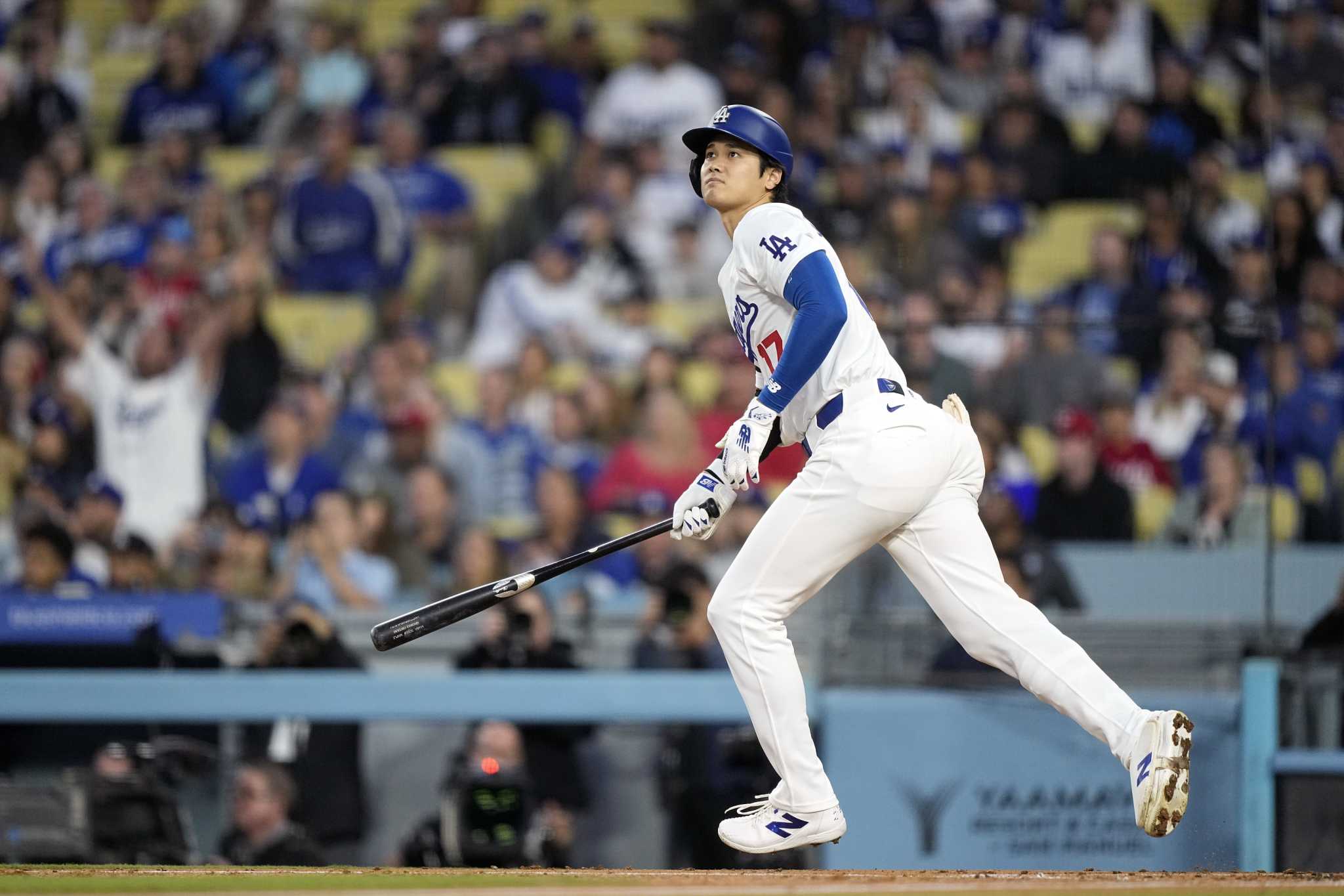 AP PHOTOS: Ohtani chases historic 50-50 club in home runs and stolen bases