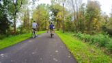 No more gaps on Pumpkinvine trail as link paved. Path grows along Red Arrow Highway, too.