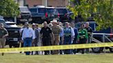 Boy, 14, arrested after four killed in Georgia school shooting