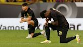 For the first time ever, Brazil's football team wear black shirts during game