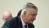 Alec Baldwin weeps in court when judge announces involuntary manslaughter case dismissed mid-trial