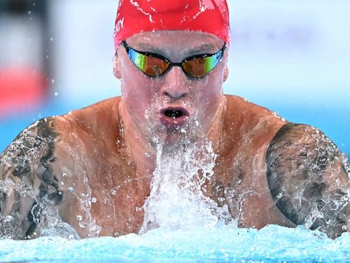 Swimming blockbuster headlines Olympics stage as Biles returns