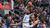 Top photos from Jaylen Brown's one-handed dunk in Game 3