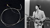 Is this the world’s most expensive guitar string? An Epiphone string Paul McCartney used to record the Beatles’ Rubber Soul is expected to fetch over $5,000 at auction