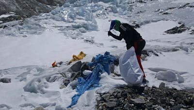 Mount Everest’s highest camp is littered with frozen garbage, and cleanup is likely to take years