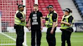 Protestor chains himself to a goalpost ahead of Scotland-Israel women's match