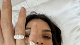 Em Rata shows off her 'divorce rings' following split