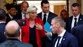 Far-right leader Le Pen questions French president's role as army chief