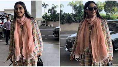 Sonam Kapoor in checkered dress with blazer is airport fashion done right