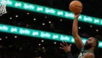 Boston's Jaylen Brown soars over Miami's Tyler Herro as the Celtics completed a 4-1 playoff series victory