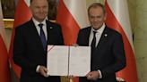 Poland's new PM Donald Tusk sworn in, completing transition of power