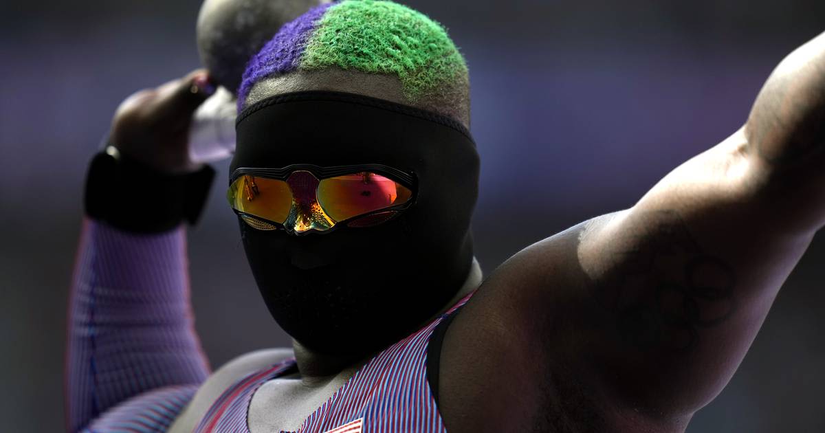 U.S. shot putter Raven Saunders wears a mask but is happy to be seen