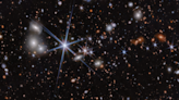 El telescopio James Webb capta la fusión de agujeros negros más lejana y primitiva hasta ahora