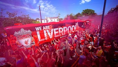 Liverpool fans greet the team bus ahead of Jurgen Klopp's final match