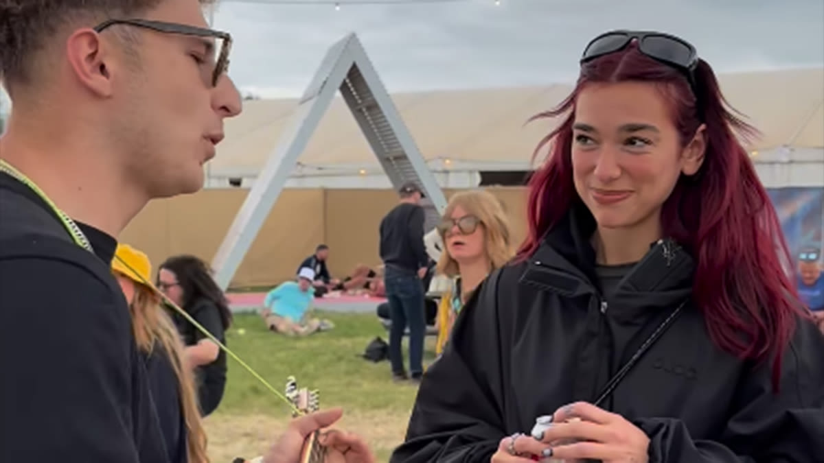 Dua Lipa's reaction to the busker who insisted on playing his song to her at Glastonbury is priceless