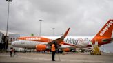 EasyJet chaos as Brit 'arrested while drunkenly trying to open door in mid-air'