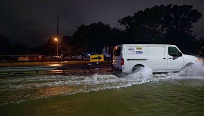 Francine weakens moving inland as the storm leaves behind flooding and widespread power outages