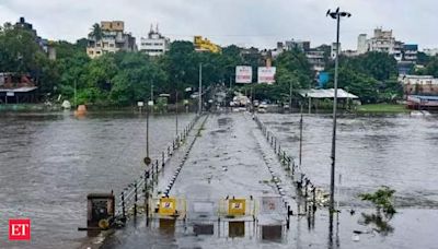 Pune faces severe disruptions amidst heavy rainfall: Schools Closed, Traffic Jams, and Flood Warnings - The Economic Times