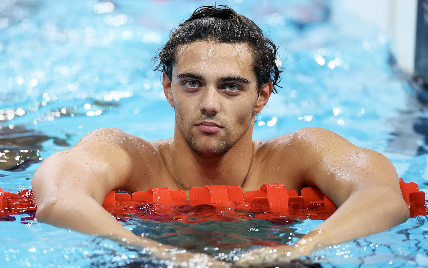 Swimmer Thomas Ceccon seen sleeping outside after remarks about Olympic Village’s lack of AC