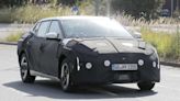 Kia EV4 spied testing with funky, concept car-like design | Auto Express