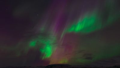 What causes the stunning display of the Northern Lights?