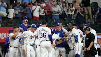 Wyatt Langford becomes first Rangers rookie with walk-off slam in a 7-4 win over Yankees and Holmes