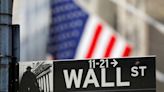 Wall St opens lower on labor costs data; Fed decision on tap