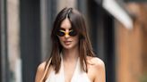 Emily Ratajkowski flashes her toned abs as she hails a taxi in Paris