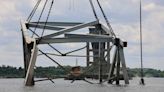 Last large steel truss bridge segment removed from channel