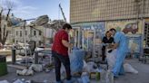 Ukraine mourns as rescuers search the rubble of a Kyiv children's hospital struck by a missile