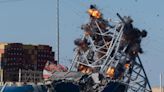 Collapsed Baltimore bridge span comes down after crews set off explosives