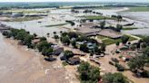 More rain possible in deluged Midwest as flooding breaches levees in Iowa