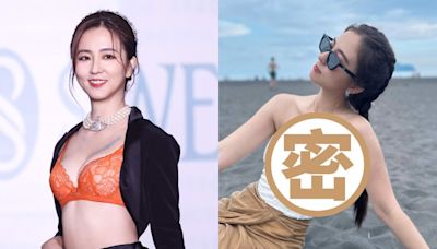 周曉涵海邊度假「側面美背大挖空」 高衩長裙白皙美腿外洩