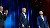 ... US presidents Barack Obama (L) and Bill Clinton (R) cheer for US President Joe Biden (C) at a high-profile fundraiser at Radio City Music...