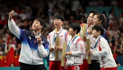 At table tennis, a North Korea medal, a news conference and a selfie