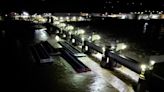 Bridges reopen after 26 barges broke loose and floated down Ohio River, damaging a marina