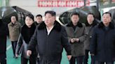 Kim Jong Un visits missile launcher factory, warns of ‘military showdown’