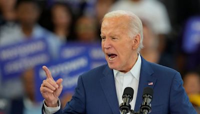 Biden shrugs off calls to exit presidential race as he takes aim at Trump’s ‘Project 2025’