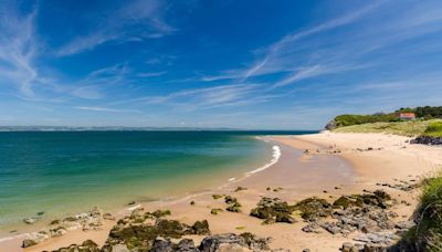 The paradise beach in Wales with lush white sands you can only get to by boat