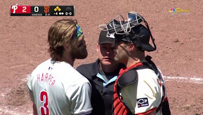 Benches clear after Harrison buzzes Harper in Giants-Phillies game